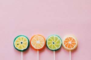 Slices of orange on a stick each with similarities and differences.